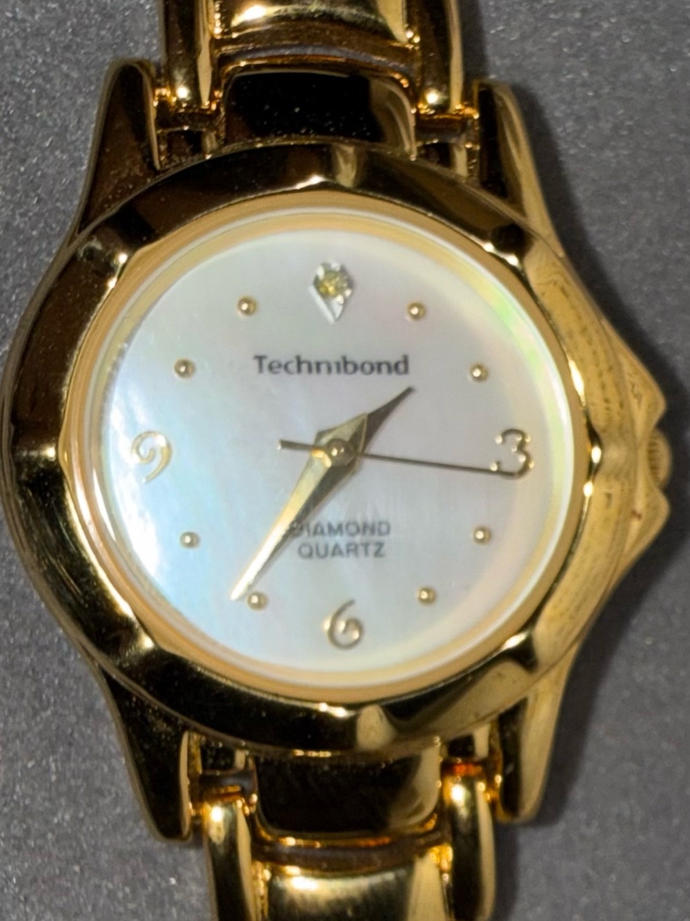 Technibond Gold and Mother-of-Pearl Women's Watch